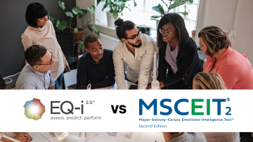a group of multiethnic business people standing and sitting around a table working together